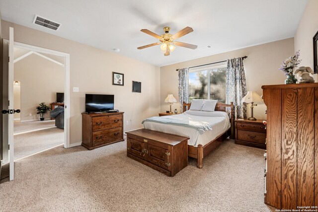 bedroom featuring carpet floors, ceiling fan, and visible vents