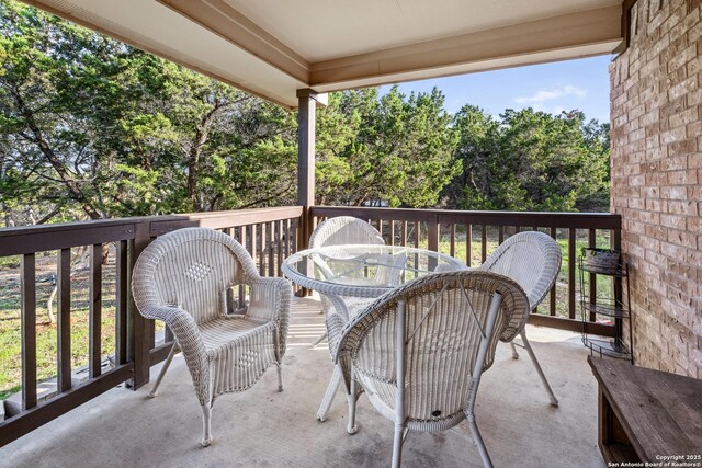 balcony featuring outdoor dining area