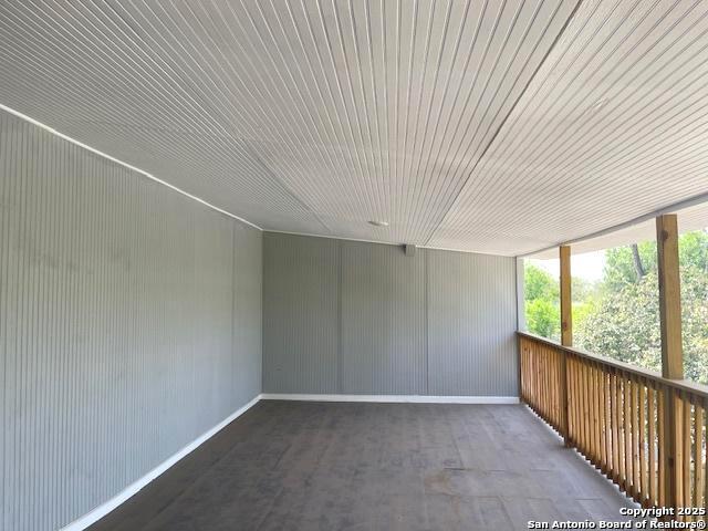 2215 Saint Anthony, San Antonio, TX 78210 - interior space with baseboards and wood finished floors