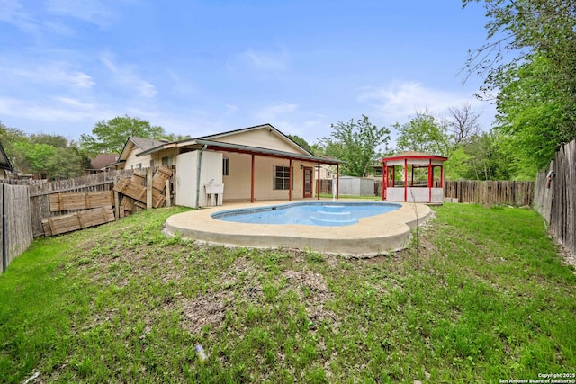 view of pool featuring a fenced in pool, a yard, and a fenced backyard