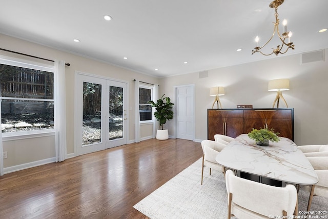 112 Coventry Ln, Terrell Hills, TX 78209 - dining room with a wealth of natural light, a notable chandelier, wood finished floors, and recessed lighting