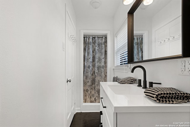 112 Coventry Ln, Terrell Hills, TX 78209 - full bathroom featuring vanity, a shower with shower curtain, and baseboards
