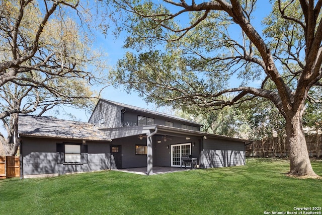 112 Coventry Ln, Terrell Hills, TX 78209 - rear view of house featuring a patio, fence, and a lawn