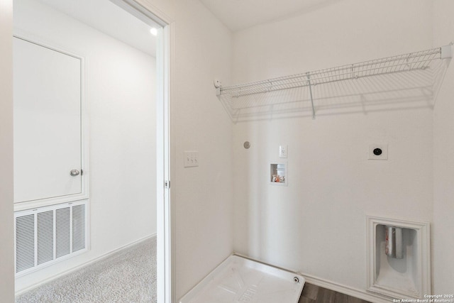 laundry area with visible vents, hookup for a gas dryer, washer hookup, laundry area, and hookup for an electric dryer