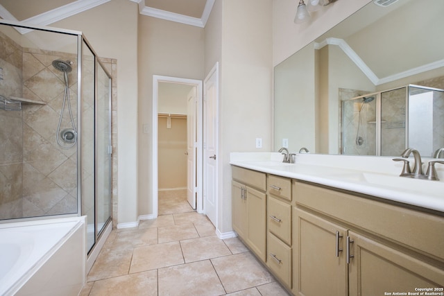 bathroom featuring a sink, ornamental molding, a stall shower, and double vanity