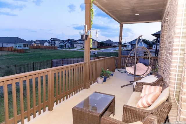 view of patio / terrace featuring a fenced backyard and a residential view