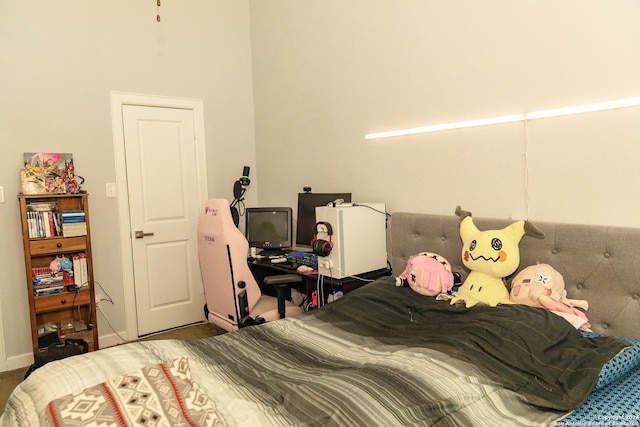 bedroom with a towering ceiling