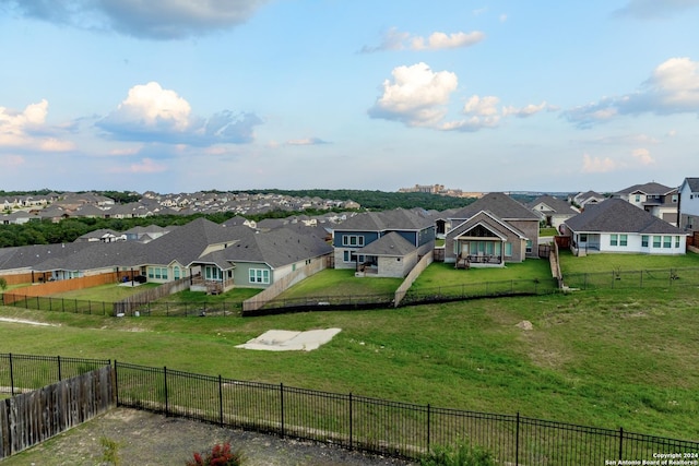 birds eye view of property with a residential view
