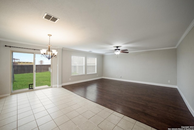 unfurnished room featuring visible vents, tile patterned flooring, crown molding, and ceiling fan with notable chandelier
