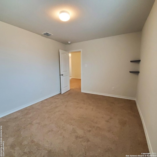 8062 Halo Cir, San Antonio, TX 78252 - carpeted empty room featuring baseboards and visible vents