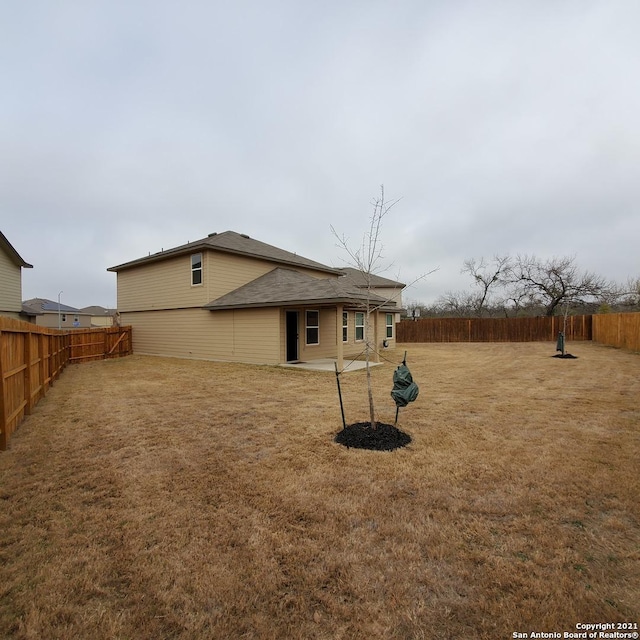 8062 Halo Cir, San Antonio, TX 78252 - exterior space featuring a fenced backyard and a patio area