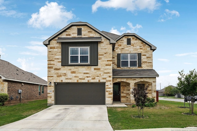 13850 Cohan Way, San Antonio, TX 78253 - view of front of property with stone siding, driveway, an attached garage, and a front lawn