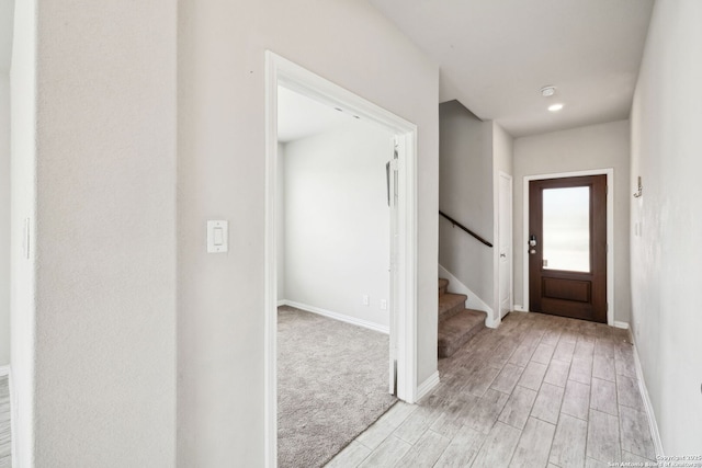 13850 Cohan Way, San Antonio, TX 78253 - foyer featuring baseboards, light wood-type flooring, and stairway
