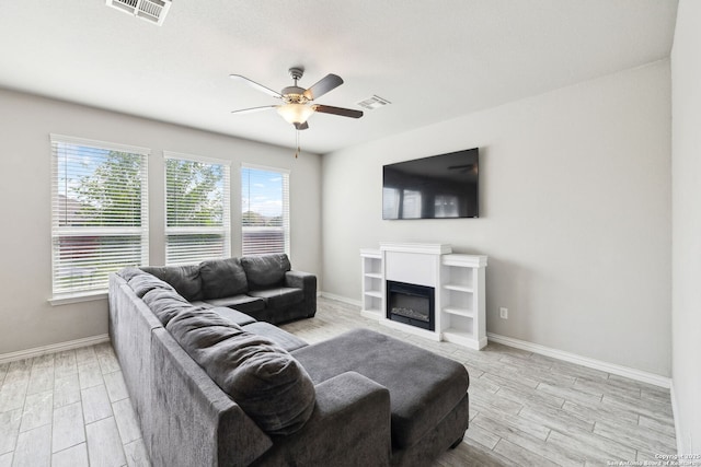 13850 Cohan Way, San Antonio, TX 78253 - living room with visible vents, ceiling fan, and a healthy amount of sunlight