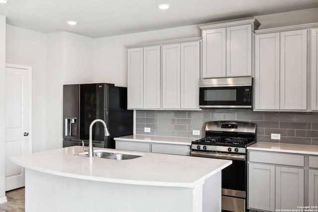 13850 Cohan Way, San Antonio, TX 78253 - kitchen featuring a sink, appliances with stainless steel finishes, recessed lighting, and decorative backsplash
