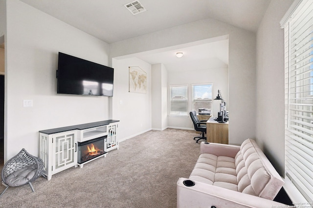 13850 Cohan Way, San Antonio, TX 78253 - office space with vaulted ceiling, baseboards, carpet floors, visible vents, and a glass covered fireplace