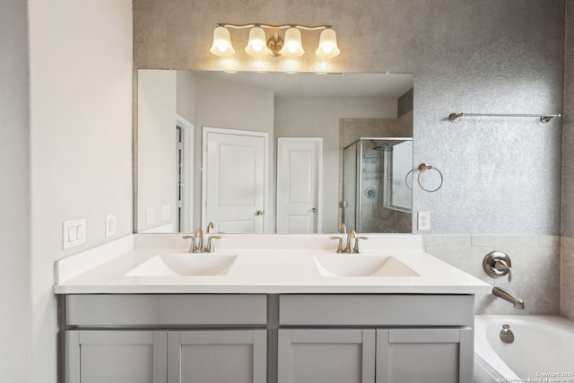 13850 Cohan Way, San Antonio, TX 78253 - bathroom with double vanity, a sink, a stall shower, and a garden tub