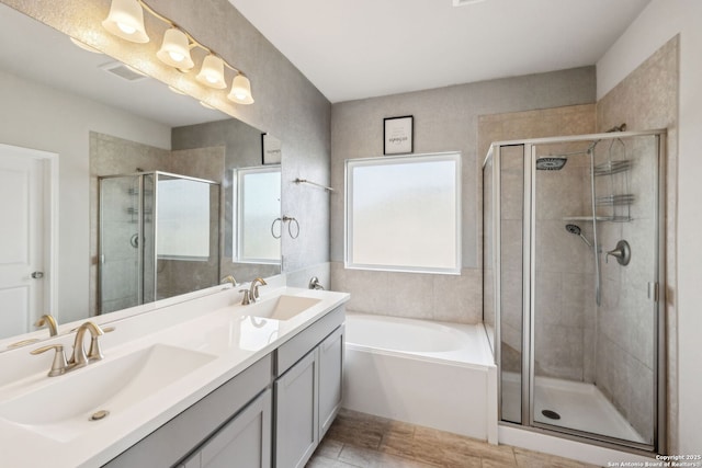 13850 Cohan Way, San Antonio, TX 78253 - full bath with a stall shower, double vanity, a sink, and a garden tub