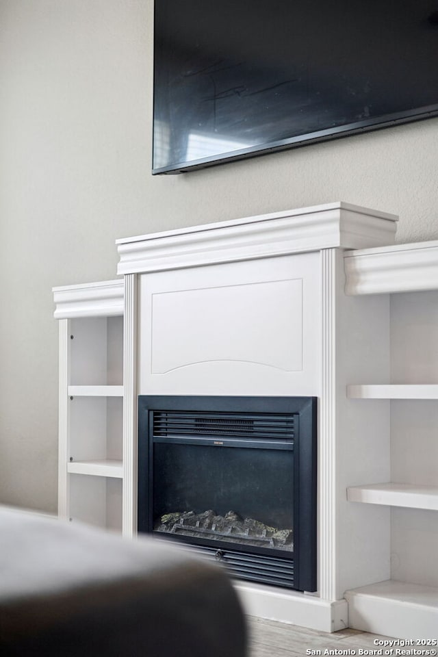 13850 Cohan Way, San Antonio, TX 78253 - details featuring a glass covered fireplace
