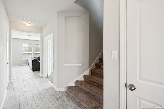 13850 Cohan Way, San Antonio, TX 78253 - staircase featuring baseboards, visible vents, and wood finish floors