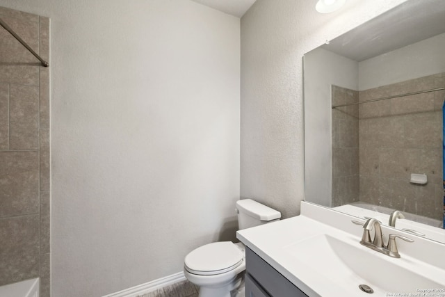 13850 Cohan Way, San Antonio, TX 78253 - bathroom featuring baseboards, a textured wall, toilet, and vanity