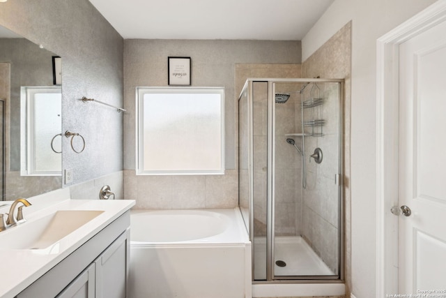 13850 Cohan Way, San Antonio, TX 78253 - bathroom featuring vanity, a bath, a shower stall, and plenty of natural light
