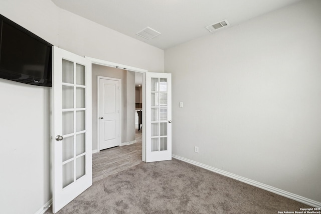 13850 Cohan Way, San Antonio, TX 78253 - carpeted spare room with french doors, baseboards, and visible vents