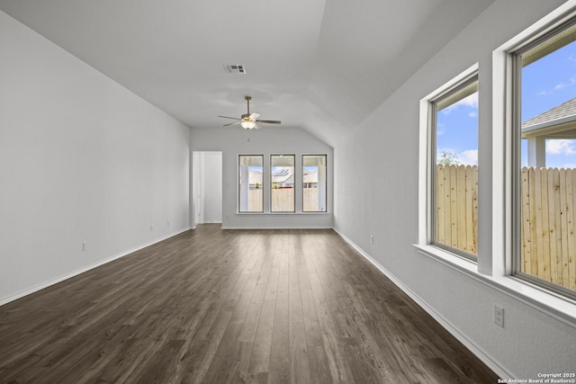 10281 Bartenheim Dr, Schertz, TX 78154 - unfurnished room with dark wood finished floors, ceiling fan, vaulted ceiling, and baseboards