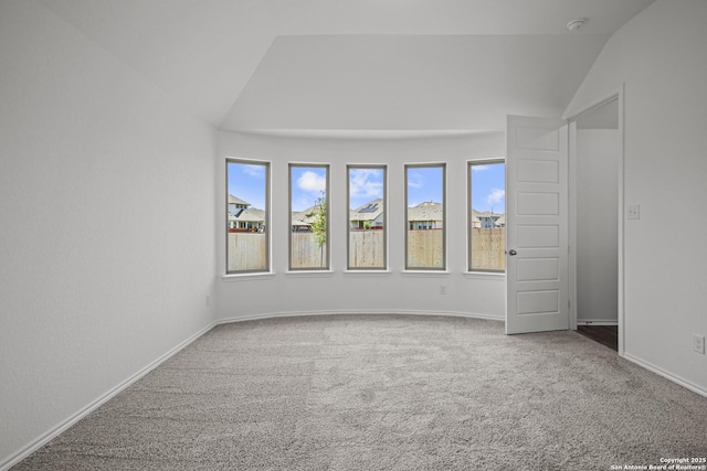 10281 Bartenheim Dr, Schertz, TX 78154 - unfurnished bedroom with vaulted ceiling, carpet flooring, and baseboards
