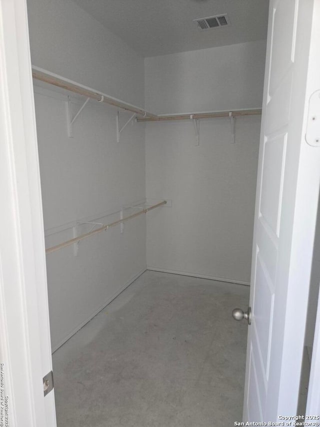 spacious closet with visible vents