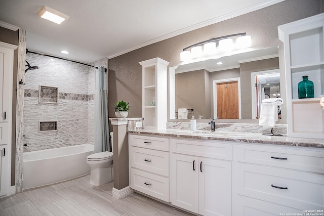 full bath with vanity, ornamental molding, toilet, and shower / bathtub combination with curtain