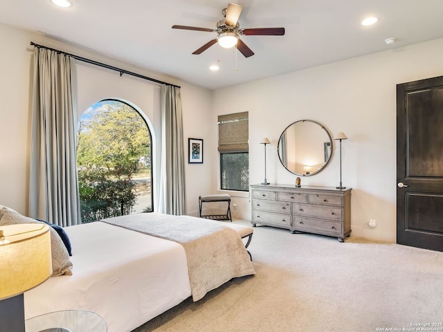 carpeted bedroom with recessed lighting and a ceiling fan