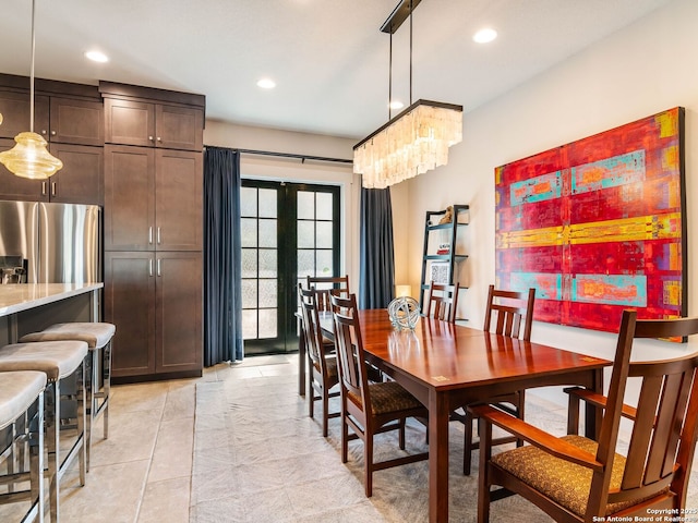 dining room featuring recessed lighting and light tile patterned floors