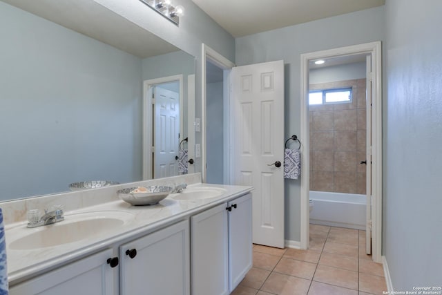 7609 Highland Park, San Antonio, TX 78250 - bathroom with tile patterned floors, double vanity, and baseboards
