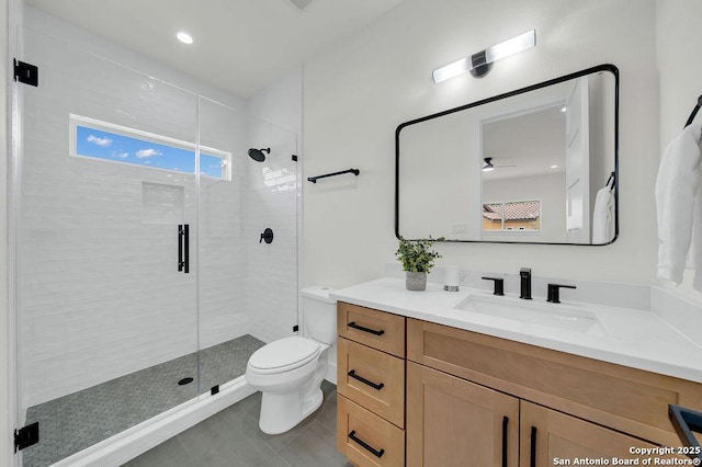 303 Pleasant Knl, San Antonio, TX 78260 - bathroom with vanity, a shower stall, toilet, and tile patterned floors
