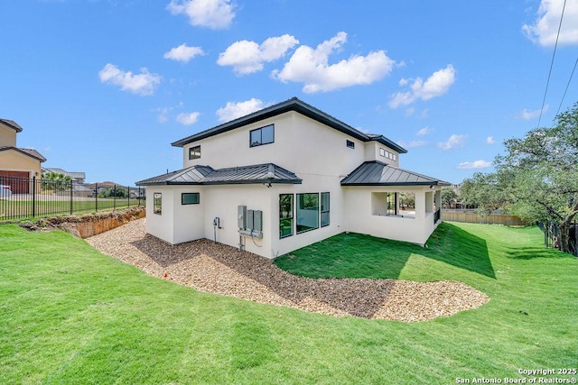 303 Pleasant Knl, San Antonio, TX 78260 - rear view of property with a standing seam roof, stucco siding, and metal roof
