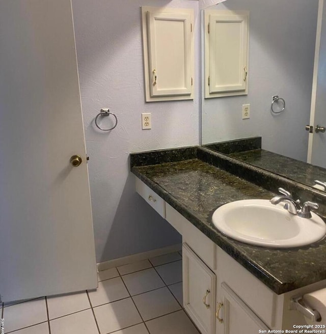 12903 La Quinta St, San Antonio, TX 78233 - bathroom featuring tile patterned flooring, vanity, and baseboards