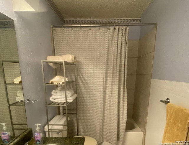 12903 La Quinta St, San Antonio, TX 78233 - bathroom featuring shower / bath combo with shower curtain and toilet