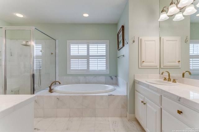 93 Bristol Grn, San Antonio, TX 78209 - full bathroom featuring a stall shower, recessed lighting, marble finish floor, a garden tub, and vanity
