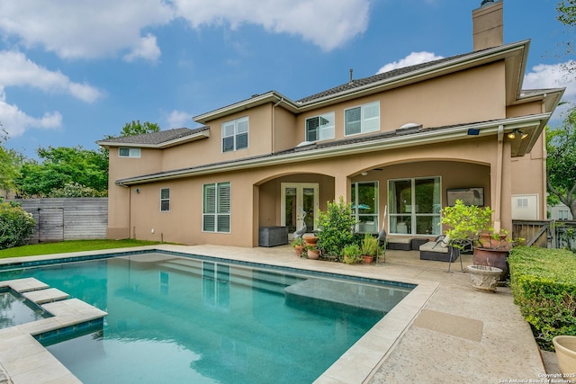 93 Bristol Grn, San Antonio, TX 78209 - back of house with a patio area, a fenced backyard, french doors, and stucco siding