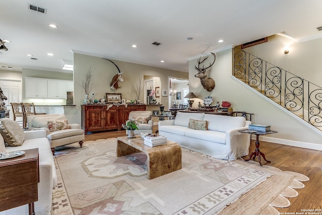 93 Bristol Grn, San Antonio, TX 78209 - living area featuring ornamental molding, light wood-style floors, visible vents, and recessed lighting