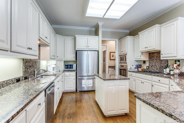 93 Bristol Grn, San Antonio, TX 78209 - kitchen with white cabinetry, stainless steel appliances, and a sink