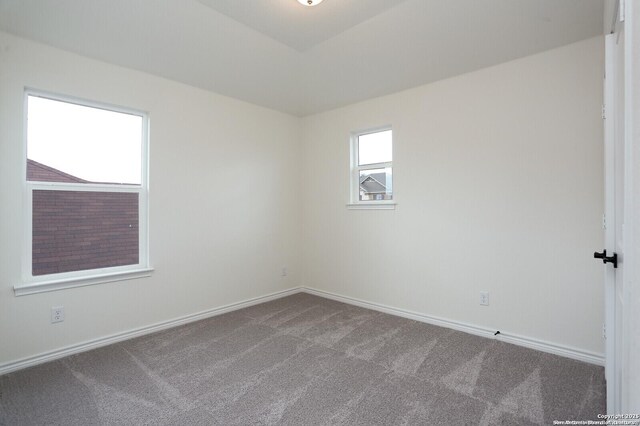 5230 Anzueto, San Antonio, TX 78261 - carpeted empty room featuring baseboards