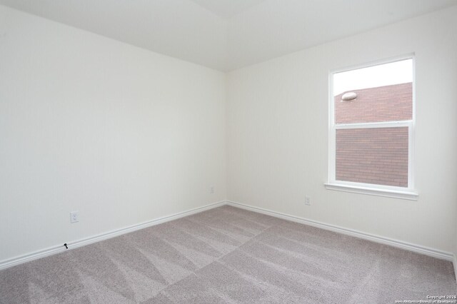 5230 Anzueto, San Antonio, TX 78261 - spare room featuring carpet floors and baseboards
