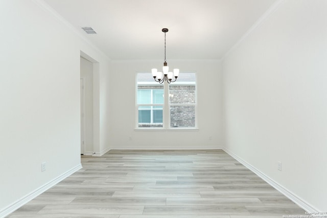 5230 Anzueto, San Antonio, TX 78261 - spare room with an inviting chandelier, ornamental molding, light wood-style floors, and visible vents