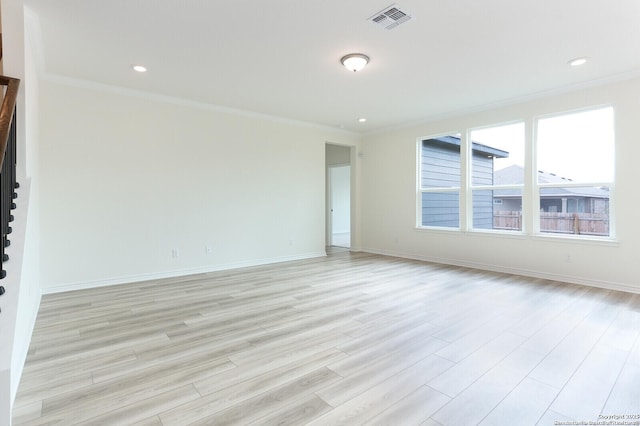 5230 Anzueto, San Antonio, TX 78261 - unfurnished room with crown molding, light wood finished floors, baseboards, visible vents, and recessed lighting