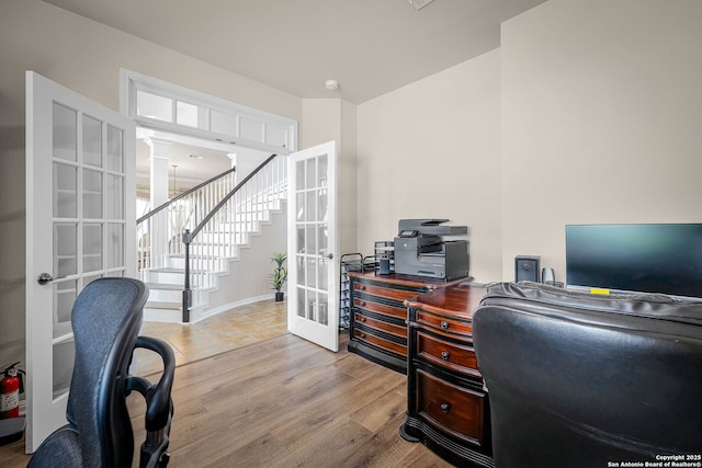 162 Teal Rdg, Canyon Lake, TX 78133 - home office with baseboards, decorative columns, wood finished floors, and french doors
