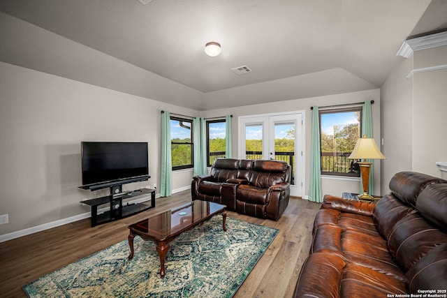 162 Teal Rdg, Canyon Lake, TX 78133 - living area featuring french doors, visible vents, a healthy amount of sunlight, and wood finished floors