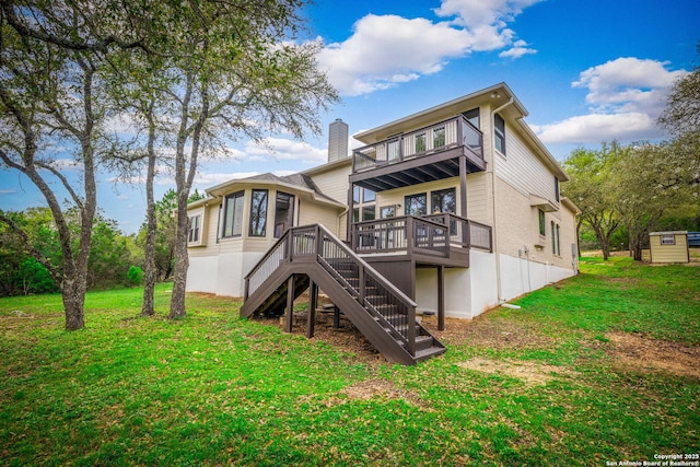 162 Teal Rdg, Canyon Lake, TX 78133 - rear view of house featuring a balcony, stairway, a yard, and a chimney