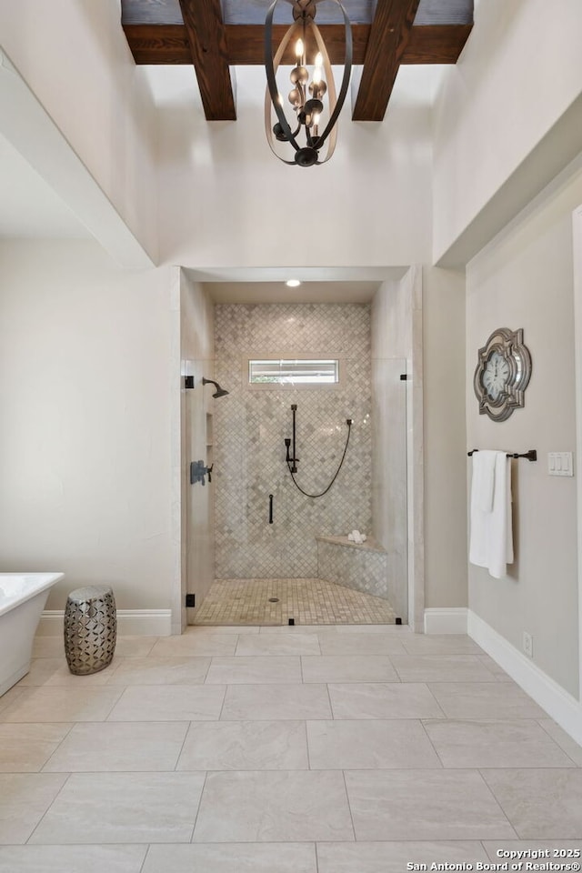 3919 El Chamizal, San Antonio, TX 78261 - full bathroom featuring baseboards, beamed ceiling, tiled shower, and a chandelier